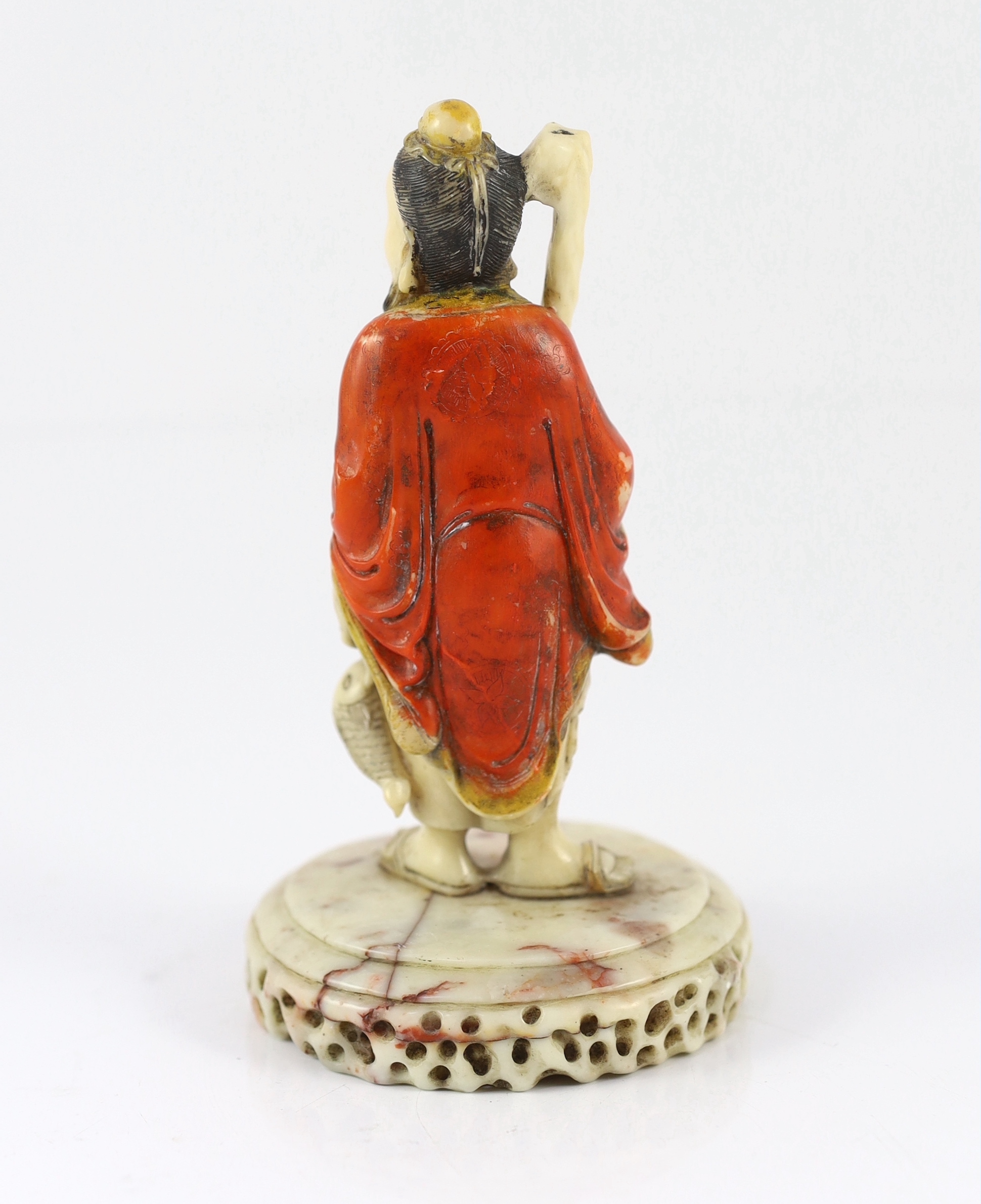 A Chinese soapstone figure of a fisherman, 17th/18th century